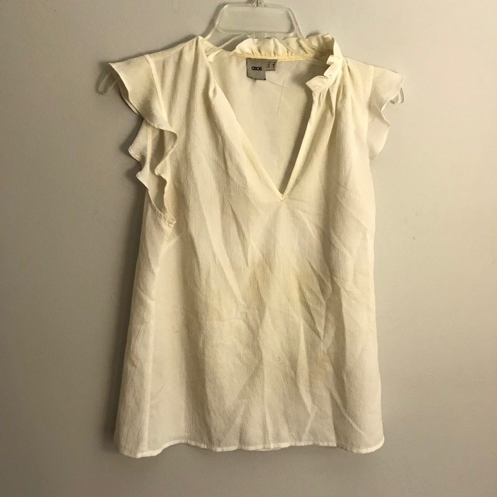 White ruffle blouse